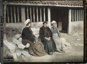three women sitting down